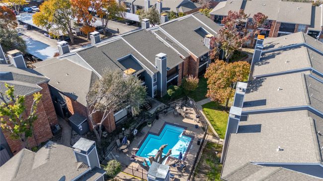Aerial view of residential area with a pool | Image 12