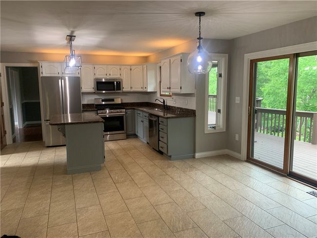 306 Marigold Drive, House other with 4 bedrooms, 3 bathrooms and 2 parking in Unity Twp PA | Image 4