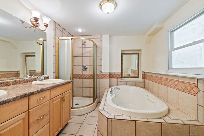 lower level bath with whirlpool tub | Image 25