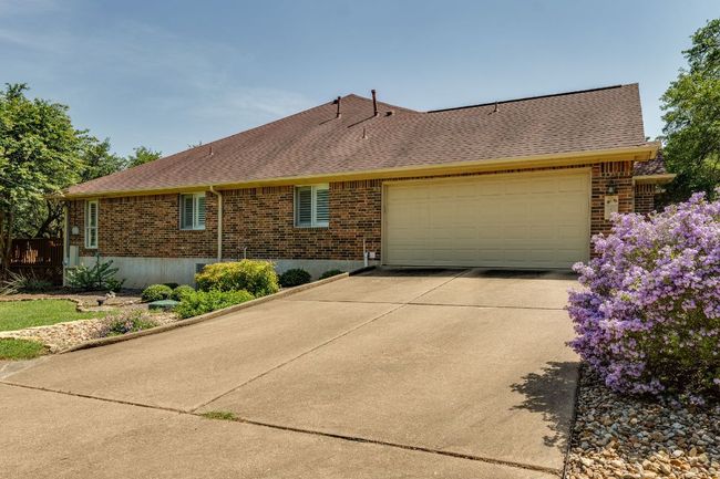 Park in the attached, side-entry, two car garage. | Image 33