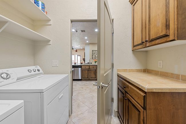 Laundry Room with Cabinets | Image 14