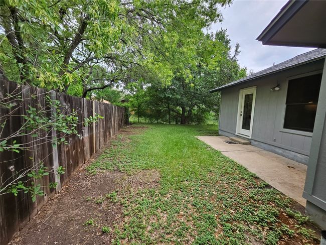 View of yard featuring fence | Image 32