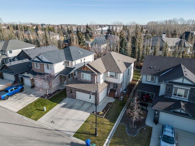 136 Crystal Green Drive, Home with 4 bedrooms, 3 bathrooms and 4 parking in Okotoks AB | Image 39