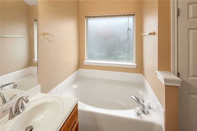 Garden tub with picture window. | Image 13