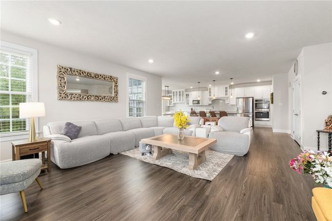 The Family Room Opens To The Kitchen | Image 9
