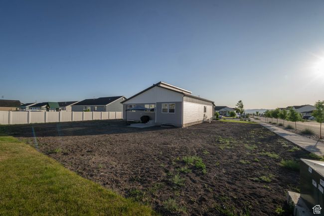 This generous .27-acre lot offers plenty of room and endless possibilities. Whether you want to create your own custom design or follow the carefully planned layout, the space is ready for you to bring your vision to life. | Image 38