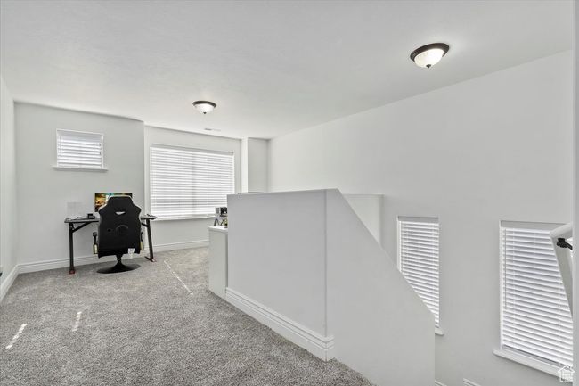 Hallway with light colored carpet | Image 15