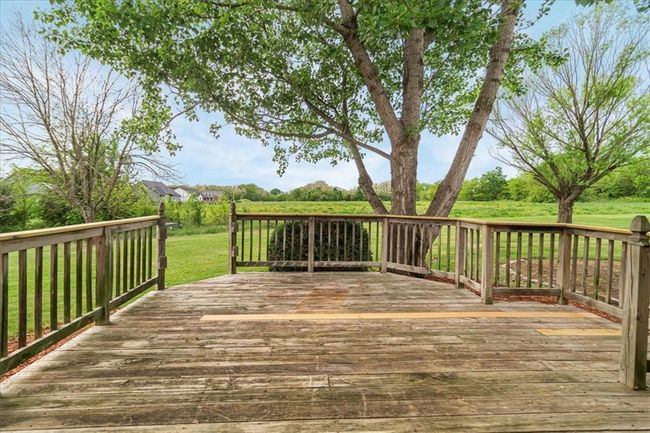 Wooden deck with a yard | Image 8