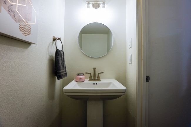 View of powder bathroom before you enter the kitchen. | Image 5