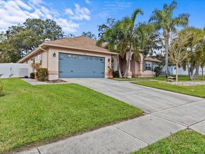 720 Woodmont Drive, House other with 4 bedrooms, 2 bathrooms and null parking in Tarpon Springs FL | Image 1