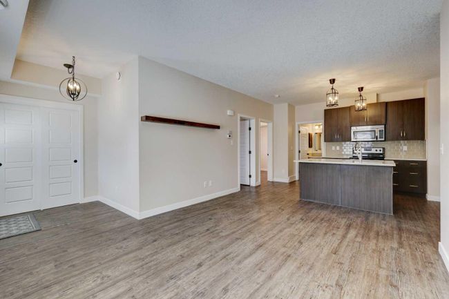 1411 - 2461 Baysprings Link Sw, Home with 2 bedrooms, 1 bathrooms and 1 parking in Airdrie AB | Image 4