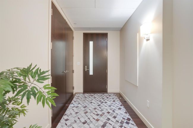 Entrance foyer with baseboards and dark wood-style flooring | Image 6