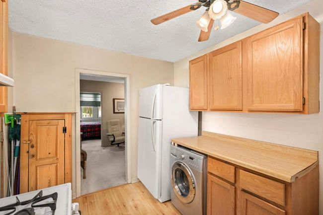 Nice counterspace in the spacious kitchen and newer refrigerator. | Image 10