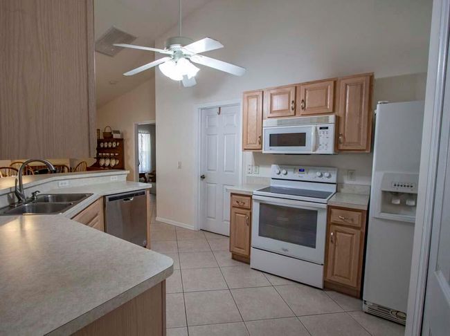 1019 Se Euclid Ln, House other with 3 bedrooms, 2 bathrooms and null parking in Port St Lucie FL | Image 12