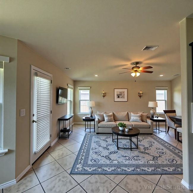 Living room featuring light tile patterned flooring, a ceiling fan, and recessed lighting | Image 15