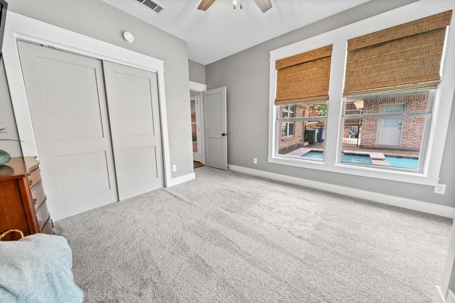 1st floor bedroom with pool views | Image 17