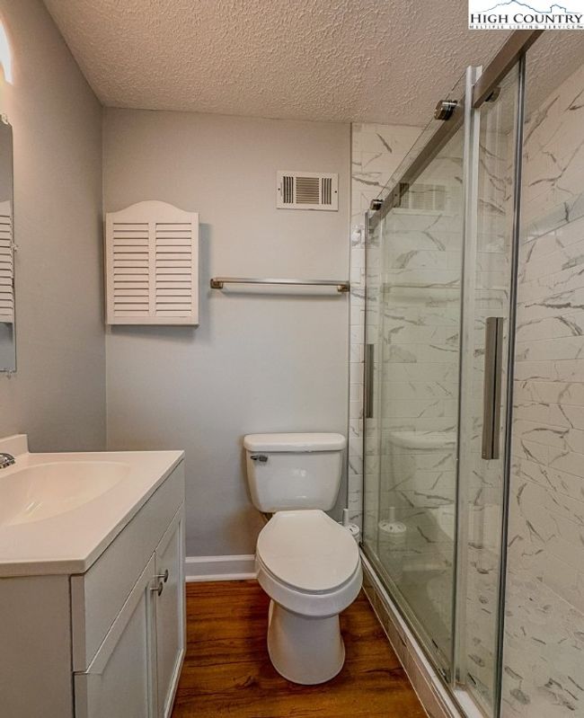 newly renovated bathroom in lower level suite | Image 31