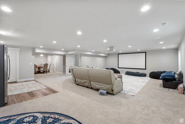 Home theater room featuring light carpet and recessed lighting | Image 27