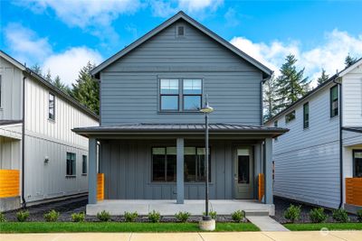 Trestlewood is a vibrant "Porch to Park" community in Lacey, Washington. The stunning Fairfax Plan features 1920 SF, 4 BRs & 3.5 BAs + 484sf ADU. Exceptional features & finishes are found throughout. | Image 1