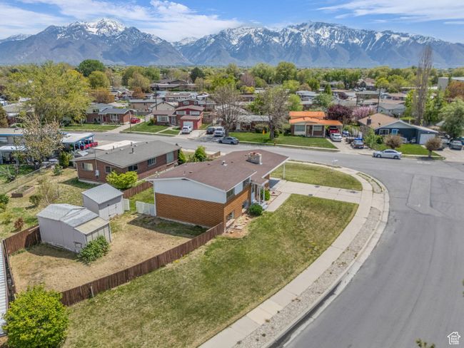 aerial view of home with the Wasatch Front as a backdrop | Image 28