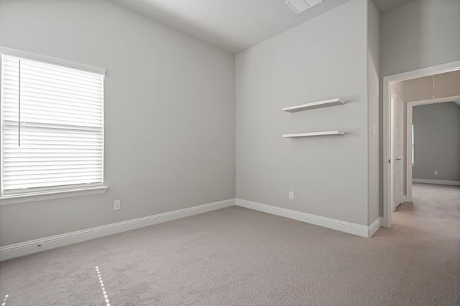 Carpeted empty room featuring baseboards and visible vents | Image 27