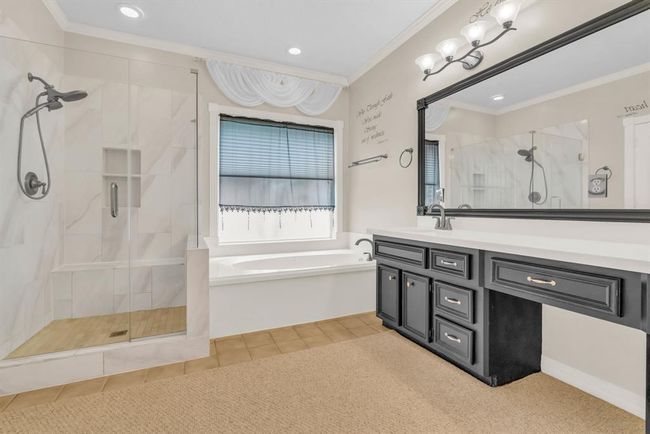 Primary bath has a separate shower & tub, as well as double sinks. | Image 17