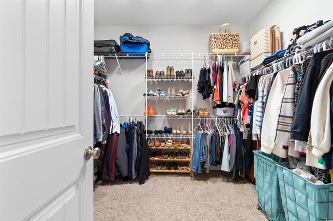 Walk in closet featuring carpet floors | Image 20