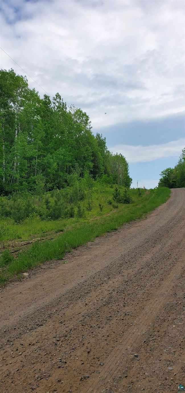 View of dirt / gravel road | Image 5