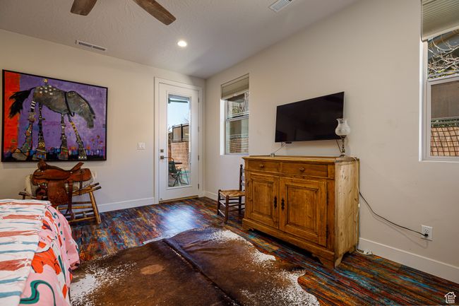 Primary Bedroom with access to exterior, dark wood-type flooring, multiple windows | Image 20