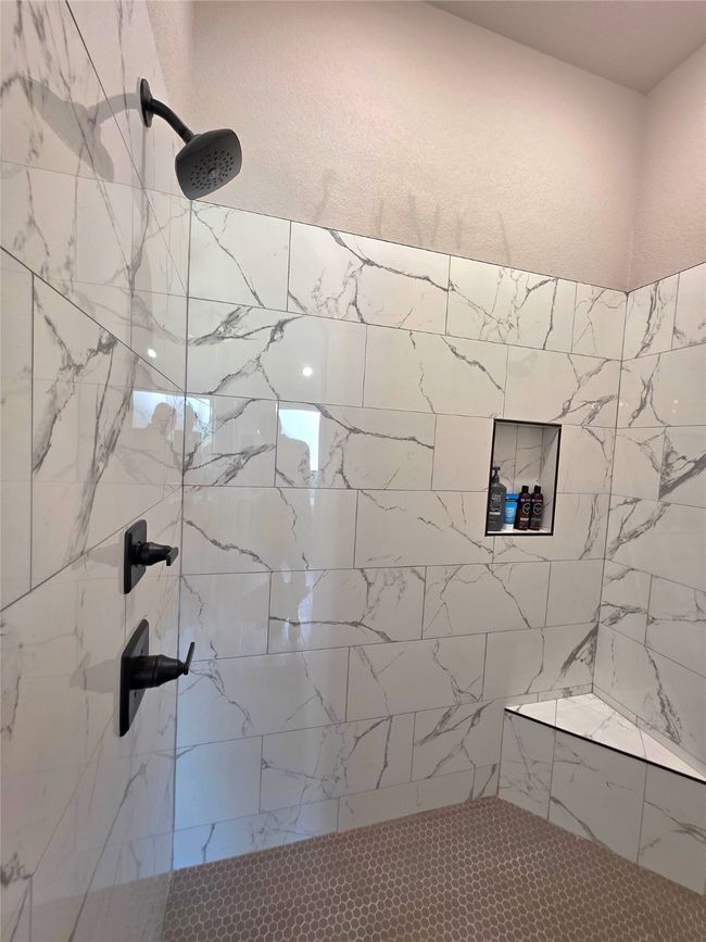 Bathroom with a tile shower | Image 27