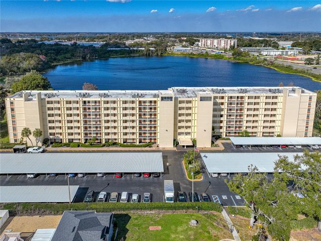 AERIAL VIEW OF CONDO, PARKING AREA, SPRING LAKE & VIEW TOWARDS THE NORTH | Image 56