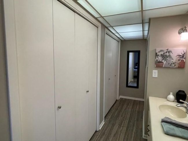 with its full wall of closets | Image 15