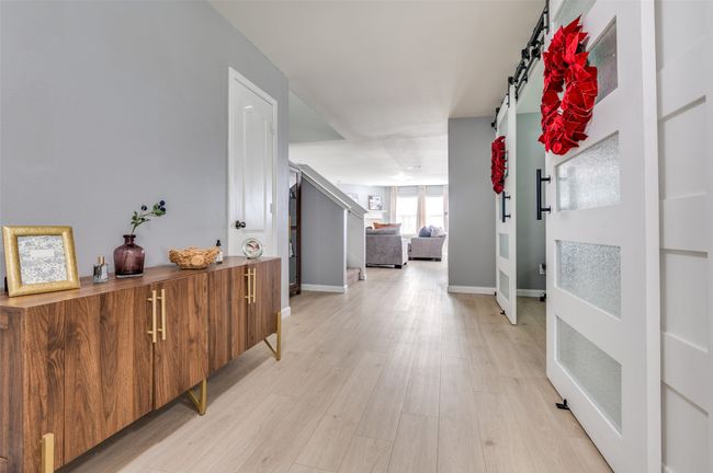 Entry view of foyer as it leads into the living and kitchen areas. | Image 16