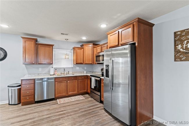 1128 Grassy Meadow Ct, Home with 3 bedrooms, 2 bathrooms and null parking in Scottsburg IN | Image 6