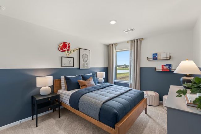 Photo of Pulte model home with same floor plan, not of actual home listed. | Image 10