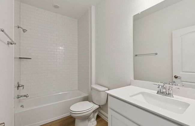 Secondary bathroom featuring modern upgrades and finishes *Real home pictured | Image 4