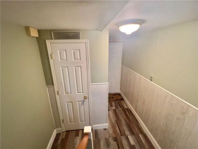 Stairs to basement with dark hardwood / wood-style flooring | Image 16