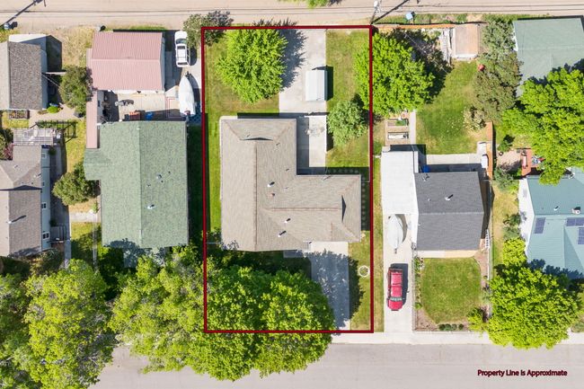 Aerial view of residential area with property parcel outlined | Image 61
