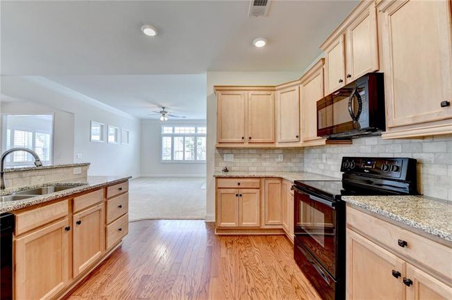 3411 Lindenridge Dr, Condo with 3 bedrooms, 3 bathrooms and null parking in Buford GA | Image 23