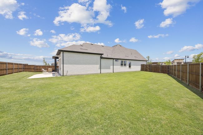 Back of property with a patio area and brick siding | Image 4