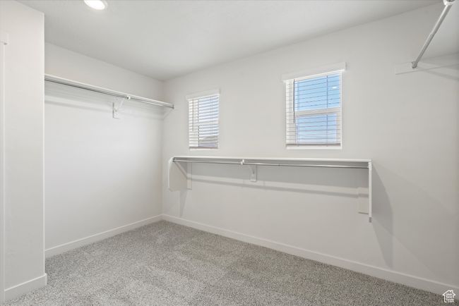 Spacious closet with carpet | Image 36