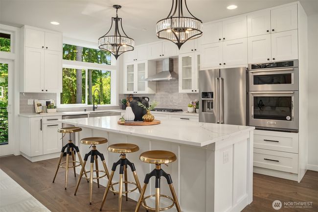 Outfitted with premium KitchenAid appliances. | Image 12