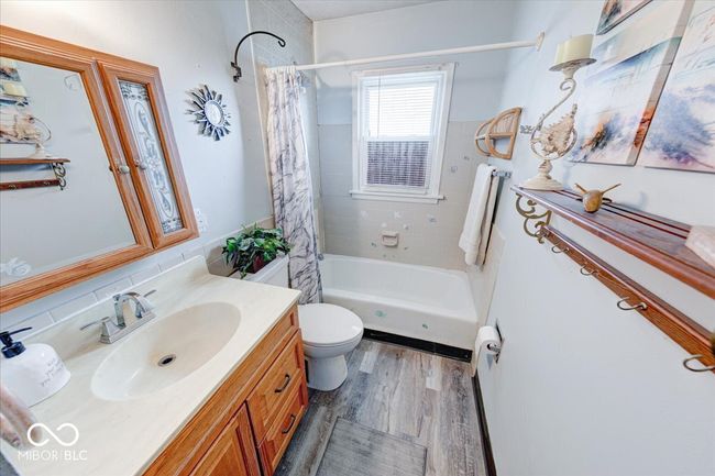 master bathroom remodeled featuring shower / tub combo, vanity, and new flooring | Image 29