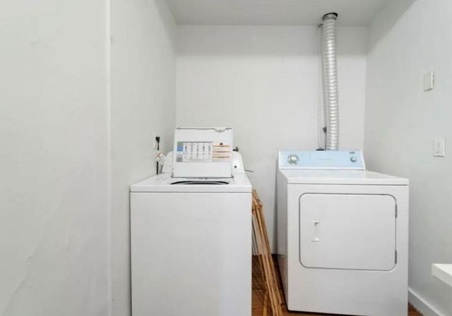 Laundry area with laundry area and independent washer and dryer | Image 6
