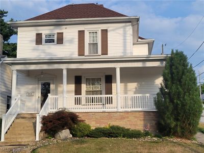 View of front of property with covered porch | Image 1