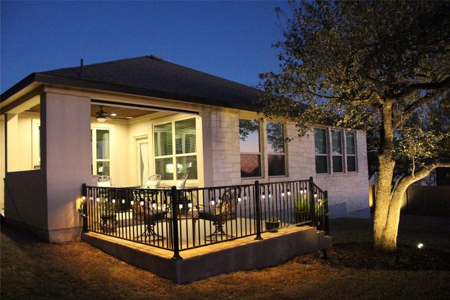 Back of house with stone siding | Image 37