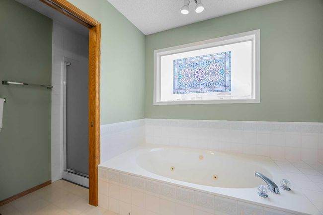 240 Arbour Ridge Way Nw, House other with 6 bedrooms, 4 bathrooms and 4 parking in Calgary AB | Image 23