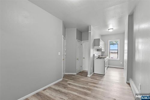 9 Monroe Street, Passaic, NJ, 07055 | Card Image