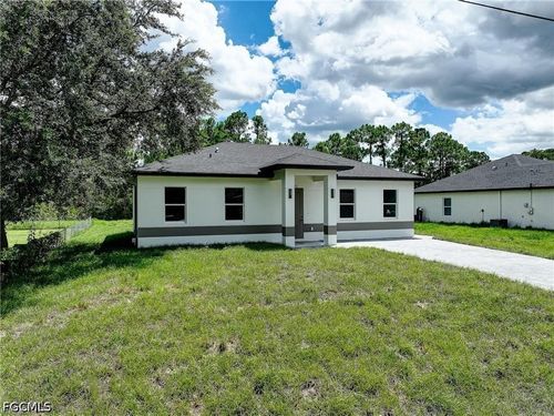 940 Lakeside Dr, LEHIGH ACRES, FL, 33974-9561 | Card Image