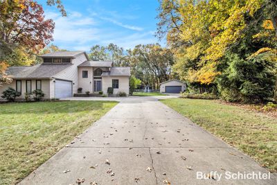 3323 N Riverwood Drive, House other with 4 bedrooms, 3 bathrooms and null parking in Twin Lake MI | Image 1